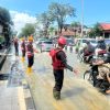 Banjir MT. Haryono Balikpapan, Brimob Atur Lalu Lintas Hingga Bersihkan Drainase